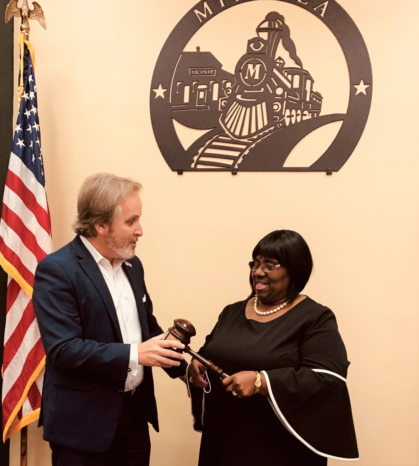 State Senator Bryan Hughes presents a state of Texas gavel to Novada Bigham, who has served on the Mineola City Council for 22 years. (Courtesy photo)